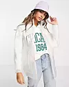 Prozirna kratka kabanica, Asos, 487,42 kn, 64,99 €.