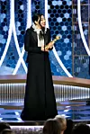 BEVERLY HILLS, CALIFORNIA - JANUARY 05: In this handout photo provided by NBCUniversal Media, LLC, Awkwafina accepts the award for BEST PERFORMANCE BY AN ACTRESS IN A MOTION PICTURE - MUSICAL OR COMEDY for