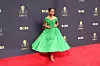 Yara Shahidi u širokoj zelenoj haljini.