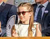 Charlotte je izazvala simpatije svojim outfitom noseći bijelu haljinu s volanima i mašnicom s prednje strane uz koju je nosila i bijele cipelice s remenčićem te Ray Ban sunčane naočale