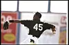 15 FEB 1994: MICHAEL JORDAN MAKES A THROW DURING HIS FIRST OUTDOOR PUBLIC WORKOUT WITH THE CHICAGO WHITE SOX AT ED SMITH STADIUM IN SARASOTA, FLORIDA. Mandatory Credit: Al Bello /Allsport