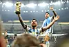Lionel Messi lifts the trophy after Argentina win the World Cup