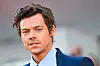 British singer and actor Harry Styles arrives on September 5, 2022 for the screening of the film ”Don‘t Worry Darling” presented out of competition as part of the 79th Venice International Film Festival at Lido di Venezia in Venice, Italy. (Photo by Tiziana FABI/AFP)