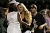 KEY BISCAYNE, FL - APRIL 02: Enrique Iglesias and girlfriend Anna Kournikova (C) greet Star Jones (L) after watching Venus Williams play her semifinal match against Serena Williams at the Sony Ericsson Open at the Crandon Park Tennis Center on April 2, 2009 in Key Biscayne, Florida. (Photo by Al Bello/Getty Images)