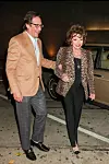 Joan Collins sa suprugom
