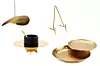 Visilica 132,73 € (1000 kn) EMMEZETA/ Držač za knjigu 8,99 € (67,74 kn) ZARA HOME/ Set za kavu 79 € (595,23 kn) DIESEL LIVING/ Pladanj 9,50 € (71,58 kn) JYSK