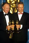 Sporedna uloga u westernu ‘Nepomirljivi‘ donijela mu je drugog Oscara u karijeri, dok je Clint Eastwood osvojio dva, za najbolji film i najboljeg redatelja