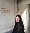 Književnica i sveučilišna profesorica u Miletini, na otoku Lezbosu. gdje je živjela i podučavala Sapfo