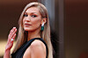US model Bella Hadid arrives for the Opening Ceremony and the screening of the film ”Partir un Jour” (Bye Bye) presented out of competition at the 78th edition of the Cannes Film Festival in Cannes, southern France, on May 13, 2025. (Photo by Sameer AL-DOUMY/AFP)