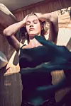 Female Getting Sum Widow Sunlight While Lying On Floor