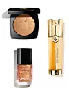 Éclat Lunaire puder iz blagdanske kolekcije sa shimmer efektom, 618 kn/81,84 €,CHANEL Le top coat, Shimmering Amber top coat, 227,90 kn/30,25 €, CHANEL Abeille Royale Double R serum za napredni piling i efekt podizanja kože lica, 1539 kn/204,38 €, GUERLAIN