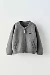 Zara pletena vesta s vezom 22,95 eura