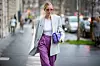 Getty Images PARIS, FRANCE - FEBRUARY 28: Leonie Hanne is seen wearing blazer, purple Bottega bag, pink pants outside Alessandra Rich during Paris Fashion Week - Womenswear Fall/Winter 2020/2021: Day Five on February 28, 2020 in Paris, France. (Photo by Christian Vierig/Getty Images)