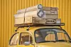 Izmir, Turkey - February 23, 2008: Group of boxes of furnitures installed at the top of an old fashioned VW car and bought from Ikea which is a Swedish company that designs and sells ready-to-assemble furniture (such as beds, chairs and desks), appliances and home accessories. Image has been captured in front of Forum Bornova Ikea Market in Bornova, Izmir.