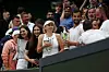 Croatia‘s Mate Pavic (CR) and Ukraine‘s Lyudmyla Kichenok (C) pose with their trophies after beating Belgium‘s Joran Vliegen and China‘s Yifan Xu during their mixed doubles final tennis match on the eleventh day of the 2023 Wimbledon Championships at The All England Lawn Tennis Club in Wimbledon, southwest London, on July 13, 2023. (Photo by Adrian DENNIS/AFP)/RESTRICTED TO EDITORIAL USE