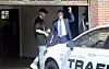 Justin Timberlake napušta zgradu suda i policijske postaje u The Hamptonsu u pratnji svog odvjetnika Eda Burkea.