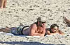 Prve zajedničke fotografije Liama Hemswortha i Gabrielle Brooks snimljene su na plaži u Byron Bayju u Australiji prije tri godine