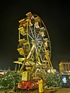 Panoramsko kolo na božićnom sajmu ispred dvorca Schönbrunn