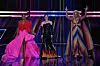 (L-R) English singer Alesha Dixon, Ukrainian singer Julia Sanina and English actress Hannah Waddingham present the first semi-final of the 2023 Eurovision Song contest at the M&S Bank Arena in Liverpool, northern England, on May 9, 2023. (Photo by Paul ELLIS/AFP)