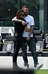*PREMIUM EXCLUSIVE * David Beckham tenderly kisses wife Victoria as the entire family visits the temporary new home of his Miami football team. Brooklyn, 21, Romeo, 17, Cruz 15, and Harper, eight, joined their proud father for a personal tour of his team's stadium. Brooklyn, who turned 21 last week, packed on the PDA with American actress Nicola Peltz, 25, as did Romeo with his girlfriend Mia Regan. Victoria seemed to be having a ball and was seen dancing to music by the Spice Girls. The visit came after fashion designer Victoria, 45, took to Instagram to update fans on her familys decision to travel to Miami to support husband David, also 45, for the launch of his football team Inter Miami CF. The former Manchester United and England star was just two games into the season when the Major Soccer League announced they have suspended their league season for the next 30 days because of coronavirus fears. 14 Mar 2020, Image: 506559728, License: Rights-managed, Restrictions: World Rights, Model Release: no, Credit line: Splash News/MEGA / The Mega Agency / Profimedia