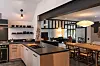 Chat show host Ellen DeGeneres and actress wife Portia De Rossi are selling a quirky English Tudor-style residence just FOUR MONTHS after purchasing it. They have put the property in the exclusive seaside community of Montecito, California up for sale for .9 million. The couple – who buy and sell real estate as a hobby – purchased it earlier in the year for just .6 million. The quirky residence was originally a pair of barn-like Tudor buildings that date to the mid-1700s. Originally built in Surrey, the antique structures were carefully dismantled, and then painstakingly reconstructed on a thickly wooded parcel of about 1.3 acres in Montecito. It is 5,500 square feet and has just two bedrooms, two full and two half bathrooms. The couple and their expert team have carried out numerous renovations while preserving the integrity of the architecture. They’ve installed a high-end new kitchen with a modern-day snack bar and brought the bathrooms up to date. Inside, there’s a huge double-height living room. There’s also an octagonal study lined with stunning, 28-pane casement windows, a small lounge with a massive corner fireplace and a lofted den that overlooks the living room. In another wing, a lofted bedroom with fireplace overlooks a second living room that is anchored by an asymmetrical brick fireplace painted bright white in its most recent overhaul. The house spills out to several brick terraces surrounded by lush and romantically sun-dappled fairy-tale gardens laced with stone pathways., Image: 516302619, License: Rights-managed, Restrictions: , Model Release: no, Credit line: IMP Features / IMP Features / Profimedia