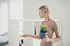 Gorgeous attractive adorable beautiful sweet pretty lady clean room in bright light house interior