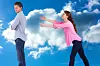 Woman trying to hug man against cloudy sky,Image: 216095988, License: Royalty-free, Restrictions: , Model Release: yes, Credit line: - / Wavebreak / Profimedia
