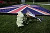 WASHINGTON, DC - SEPTEMBER 8: Flowers laid in tribute at the British Embassy after the death of Queen Elizabeth II was announced on September 8, 2022 in Washington, DC. Elizabeth Alexandra Mary Windsor was born in Bruton Street, Mayfair, London on 21 April 1926. She married Prince Philip in 1947 and acceded the throne of the United Kingdom and Commonwealth on 6 February 1952 after the death of her Father, King George VI.Queen Elizabeth II died at Balmoral Castle in Scotland on September 8, 2022, and is survived by her four children, Charles, Prince of Wales, Anne, Princess Royal, Andrew, Duke Of York and Edward, Duke of Wessex. Win McNamee,Image: 720736384, License: Rights-managed, Restrictions:, Model Release: no, Credit line: WIN MCNAMEE/Getty images/Profimedia