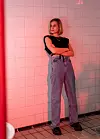 Široke traperice Zara, čizme Doc Martens i kombinacija kultne The Frankie Shop majice s uz satenski grudnjak na vezanje ispod majice jedan su od outfita koji je složil Ivana Vukušić