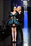PARIS, FRANCE - JANUARY 22: Fashion designer Jean Paul Gaultier kisses Dita Von Teese at the finale of Jean Paul Gaultier show as part of Paris Fashion Week Haute Couture Spring/Summer 2014 on January 22, 2014 in Paris, France. (Photo by Pascal Le Segretain/Getty Images)