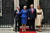 LONDON, ENGLAND - JUNE 04: (L-R) Philip May, British Prime Minister Theresa May, US President Donald Trump and First Lady Melania Trump arrive at 10 Downing street for a meeting on the second day of the U.S. President and First Lady's three-day State visit on June 4, 2019 in London, England. President Trump's three-day state visit began with lunch with the Queen, followed by a State Banquet at Buckingham Palace, whilst today he will attend business meetings with the Prime Minister and the Duke of York, before travelling to Portsmouth to mark the 75th anniversary of the D-Day landings.(Photo by Dan Kitwood/Getty Images)