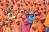 ZANZIBAR, TANZANIA - SEPTEMBER 14: Tanzanians wait to welcome as volunteers of