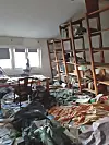 Unutrašnjost stana obitelji Vrga, u kojem je uništen dobar dio biblioteke s 5000 knjiga.