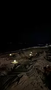 Večernje opuštanje na plaži uz svijeće
