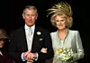 Prince Charles and Camilla, Duchess of Cornwall after their blessing at St George's Chapel THE ROYAL WEDDING OF PRINCE CHARLES AND CAMILLA PARKER BOWLES, WINDSOR, BRITAIN - 09 APR 2005 MARRIAGE GOLD METALLIC FEATHER FEATHERS SWAROWSKI DIAMOND DIAMONDS HEADDRESS HAT BRITISH,Image: 221369524, License: Rights-managed, Restrictions: , Model Release: no, Credit line: - / Shutterstock Editorial / Profimedia