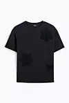 C&A crni t-shirt s heklanim cvijetovima (12.99 eura)