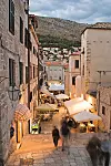 Colorful cafes and vendors in the market at Gunduliceva Poljana. In the Stari Grad (Old Town) of Dubrovnik. A UNESCO World Heritage Site. Dusk light.