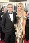 HOLLYWOOD, CA - FEBRUARY 26: Actor George Clooney (L) and Stacy Keibler arrive at the 84th Annual Academy Awards held at the Hollywood & Highland Center on February 26, 2012 in Hollywood, California. (Photo by Jason Merritt/Getty Images)
