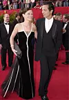 386900 228: Actress Julia Roberts, who won an Oscar for Best Actress, and her boyfriend Benjamin Bratt arrive for the 73rd Annual Academy Awards March 25, 2001 at the Shrine Auditorium in Los Angeles. Bratt is wearing an Armani Suit and Roberts is wearing a vintage Valentino dress from 1982 with Van Cleef and Arpels jewelry. Her hair is by Serge Normant of the Jed Root Agency and her makeup is by Genivive Herr. (Photo by Getty Images