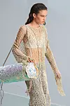 Acne Studios - ribarska mreža najbolje izgleda na ljetne topiće i kratke hlače.