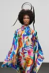 Kolekcija se sasotji od 32 outfita izrađenih od custom made tkanina, među kojima su transparentne organdi podloge s apstraktnim i žakard motivima u vibrantnim bojama