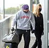 06/25/2020 EXCLUSIVE: Brooklyn Beckham with girlfriend Nicola Peltz arrive at JFK Airport in New York City to catch a flight out. The inseparable couple were pictured with an array of high end luggage including a Chanel quilted bag, Goyard duffle bag, and a Supreme suitcase. Nicola, 25, wore a black hoodie, matching Levi jeans, and chunky Prada boots. **VIDEO AVAILABLE**,Image: 536055119, License: Rights-managed, Restrictions: Exclusive NO usage without agreed price and terms. Please contact sales@theimagedirect.com, Model Release: no, Credit line: TheImageDirect.com / The Image Direct / Profimedia