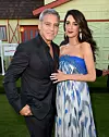 LOS ANGELES, CA - OCTOBER 22: Executive producer/director George Clooney and his wife Amal Clooney arrive at the premiere of Paramount Pictures'