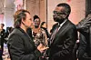 Senegalese singer Youssou N'dour (R) speaks with Irish rock band U2 singer Bono (L) as they arrive at Lyon's city hall, central eastern France, on October 9, 2019, during the funding conference of Global Fund to Fight AIDS, Tuberculosis and Malaria. The Global Fund to Fight AIDS, Tuberculosis and Malaria on October 9, 2019, opened a drive to raise billion to fight a global epidemics but face an uphill battle in the face of donor fatigue. The fund has asked for billion, an amount it says would help save 16 million lives, avert
