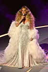 US singer Mariah Carey performs during the opening ceremony of the Milano Cortina 2026 Winter Olympic Games at the San Siro stadium in Milan, northern Italy, on February 6, 2026. (Photo by Piero CRUCIATTI/AFP)