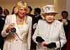 LONDON, ENGLAND - DECEMBER 10: Camilla, Duchess of Cornwall and Queen Elizabeth II visit the new Barnardo's HQ in Barkingside on December 10, 2013 in London, England. (Photo by Chris Radburn - WPA Pool/Getty Images)
