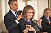 WASHINGTON, DC - NOVEMBER 20: Gloria Steinem (R) receives the 2013 Presidential Medal of Freedom from President Barack Obama at the White House on November 20, 2013 in Washington, DC. (Photo by Leigh Vogel/WireImage)