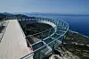 Makarska, 240620 Skywalk ili nebeska setnica koja je dovrsena na predjelu Ravna Vlaska na planini Biokovo iznad Makarske. Luk prekriven staklom strsi 12m od ruba litice visoke 1228m i jedini je takav u Hrvatskoj. Nova biokovska atrakcija ceka skoro otvaranje. Na fotografiji : Skywalk na planini Biokovo. Foto: Ivo Ravlic / CROPIX