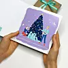 Jedinstvena knjižica s božićnim ilustracijama