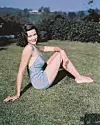 American actress Gene Tierney (1920 - 1991) in a pale blue swimsuit, circa 1945. (Photo by Silver Screen Collection/Hulton Archive/Getty Images)
